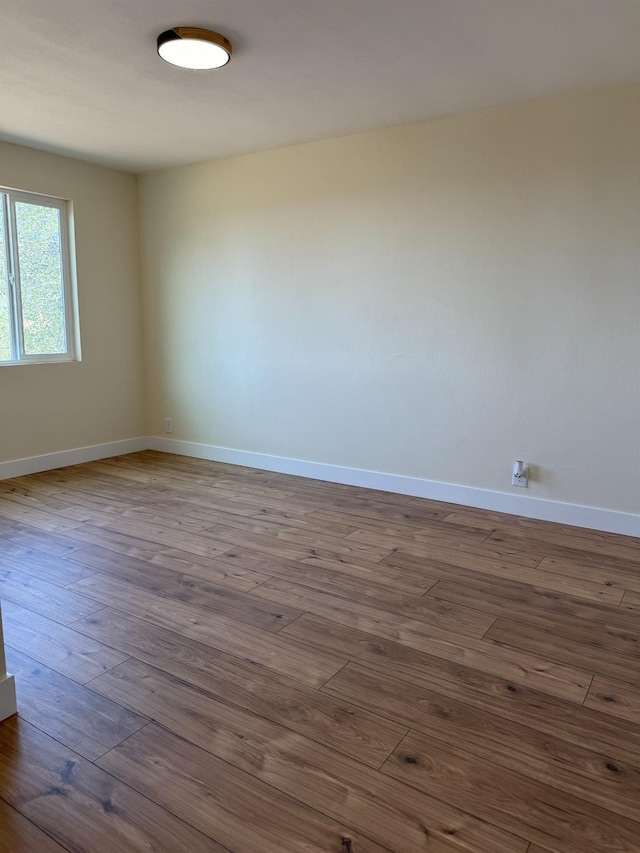1248 Crane Ln, Yokuts Valley, CA 93675 - spare room featuring dark wood finished floors and baseboards