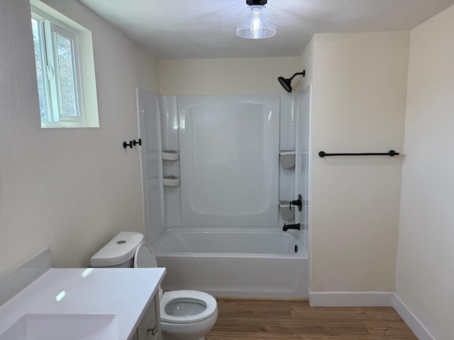 1248 Crane Ln, Yokuts Valley, CA 93675 - full bath with wood finished floors, vanity, and shower / washtub combination