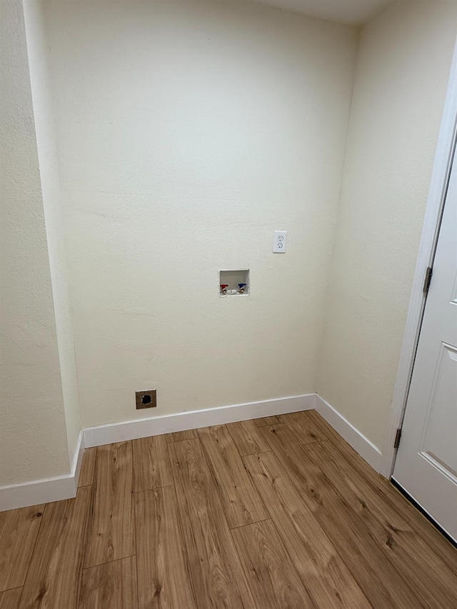 1248 Crane Ln, Yokuts Valley, CA 93675 - laundry room with hookup for a washing machine, light wood finished floors, and hookup for an electric dryer