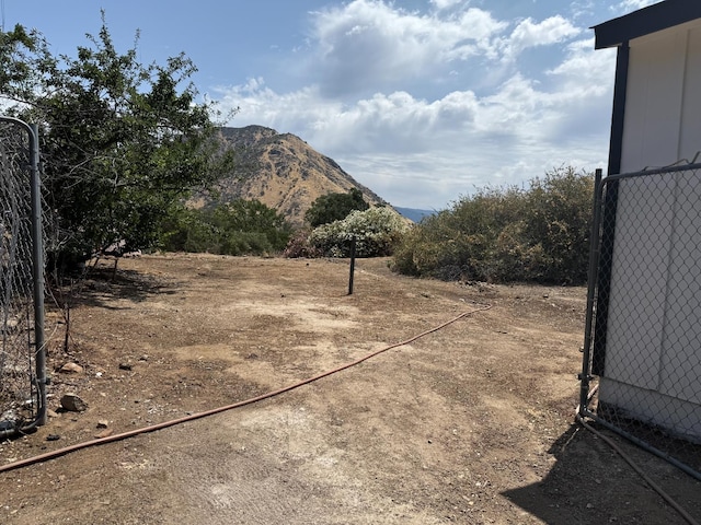 1248 Crane Ln, Yokuts Valley, CA 93675 - view of yard featuring a mountain view
