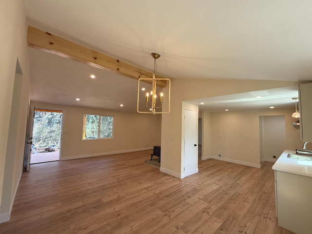 1248 Crane Ln, Yokuts Valley, CA 93675 - unfurnished dining area featuring light wood-style floors, a chandelier, and recessed lighting