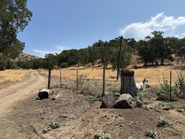 1248 Crane Ln, Yokuts Valley, CA 93675 - view of yard featuring a view of rural / pastoral area