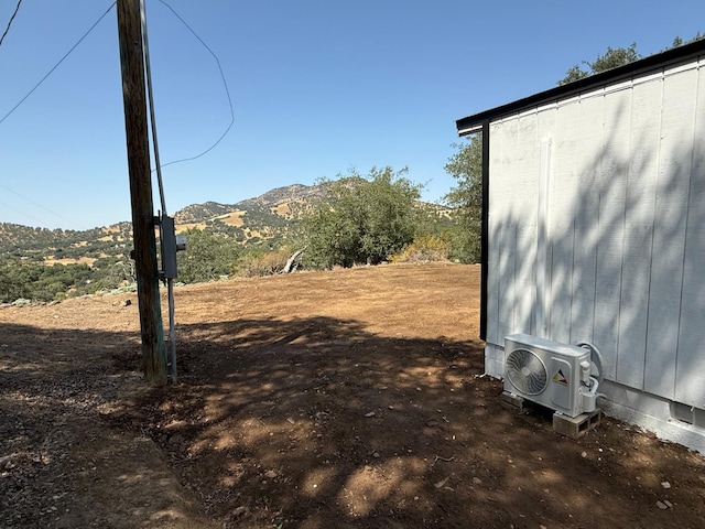 1248 Crane Ln, Yokuts Valley, CA 93675 - view of yard with a mountain view