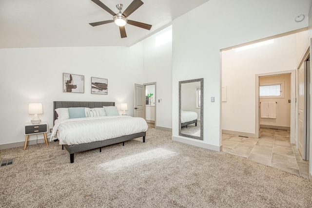 254 W Sierra Ave, Clovis, CA 93612 - bedroom with light colored carpet, high vaulted ceiling, and a ceiling fan
