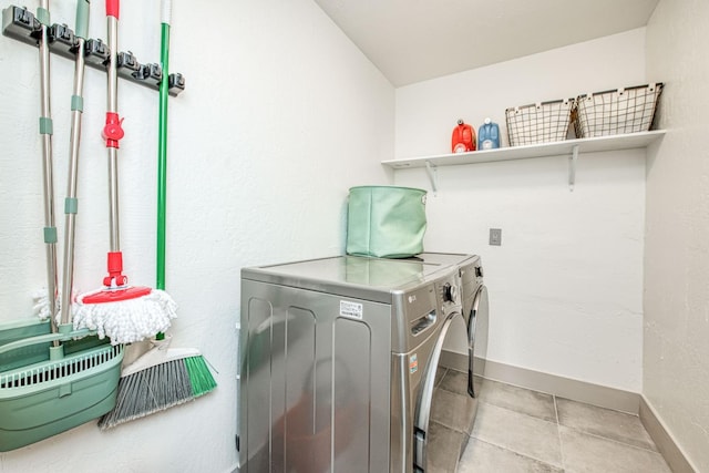 254 W Sierra Ave, Clovis, CA 93612 - washroom featuring separate washer and dryer and tile patterned flooring