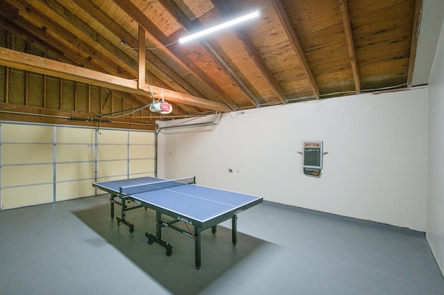 254 W Sierra Ave, Clovis, CA 93612 - recreation room featuring a garage, finished concrete flooring, and lofted ceiling