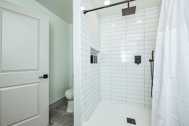254 W Sierra Ave, Clovis, CA 93612 - full bathroom featuring a shower stall and toilet