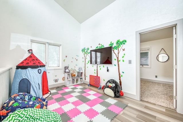 254 W Sierra Ave, Clovis, CA 93612 - game room with wood finished floors and high vaulted ceiling
