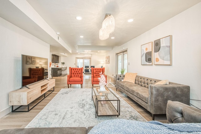 254 W Sierra Ave, Clovis, CA 93612 - living area featuring wood finished floors, recessed lighting, and a chandelier