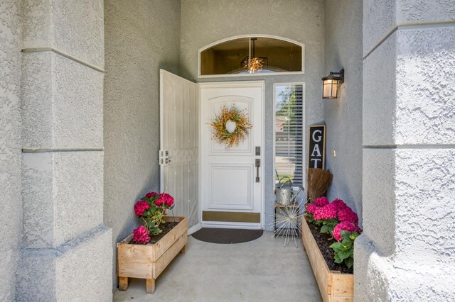 1760 E Ticonderoga Dr, Fresno, CA 93720 - property entrance with stucco siding