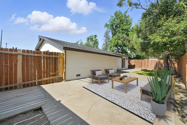 4506 N Angus St, Fresno, CA 93726 - fenced backyard with a patio area and outdoor lounge area