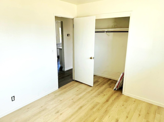 3122 Belmira Rd, Atwater, CA 95301 - unfurnished bedroom with wood finished floors and a closet