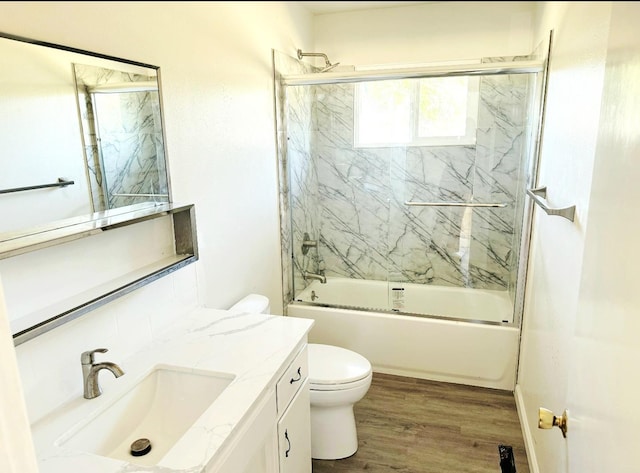 3122 Belmira Rd, Atwater, CA 95301 - bathroom with enclosed tub / shower combo, vanity, and wood finished floors