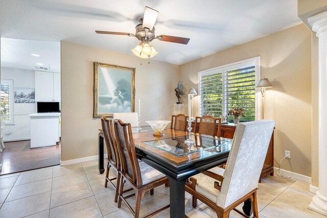3075 W Silverhill Ln, Fresno, CA 93711 - dining room featuring a ceiling fan, light tile patterned flooring, and decorative columns