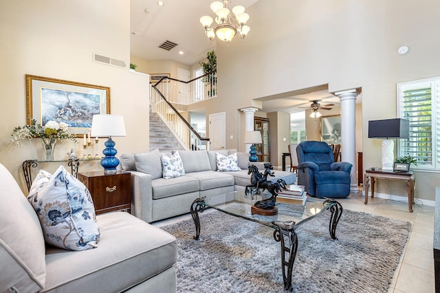 3075 W Silverhill Ln, Fresno, CA 93711 - tiled living room featuring ornate columns, a towering ceiling, a ceiling fan, stairway, and recessed lighting