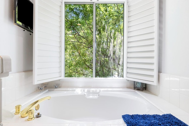 3075 W Silverhill Ln, Fresno, CA 93711 - bathroom featuring healthy amount of natural light and a bath