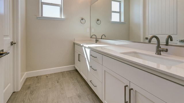 951 Talus Way S, Madera, CA 93636 - full bathroom with double vanity and wood finished floors