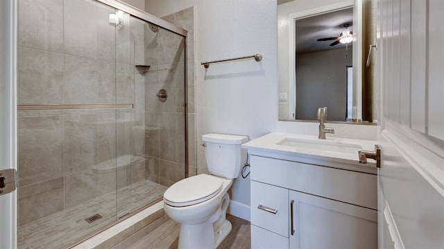 951 Talus Way S, Madera, CA 93636 - bathroom with vanity, a stall shower, wood finished floors, and ceiling fan