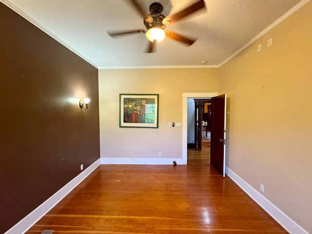 807 N Van Ness Ave, Fresno, CA 93728 - spare room featuring a ceiling fan, ornamental molding, and wood finished floors