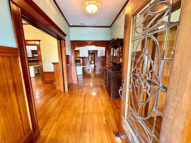 807 N Van Ness Ave, Fresno, CA 93728 - foyer featuring wood finished floors, crown molding, and a wainscoted wall