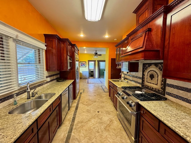 807 N Van Ness Ave, Fresno, CA 93728 - kitchen featuring appliances with stainless steel finishes, dark brown cabinets, recessed lighting, backsplash, and a ceiling fan