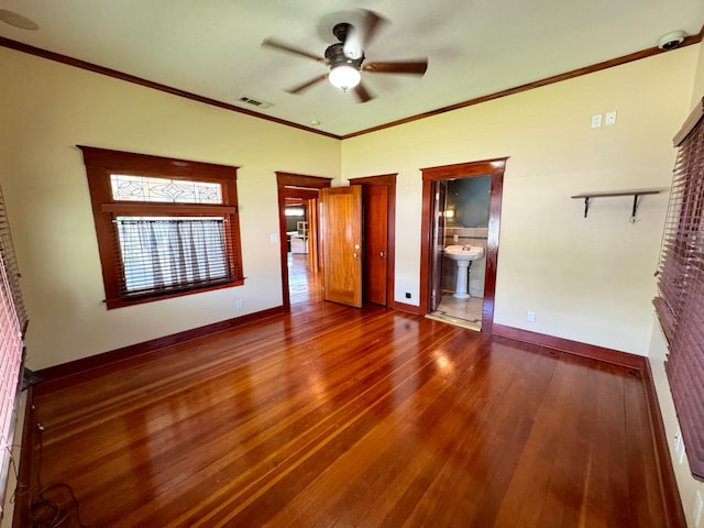 807 N Van Ness Ave, Fresno, CA 93728 - spare room with ceiling fan, wood finished floors, and crown molding