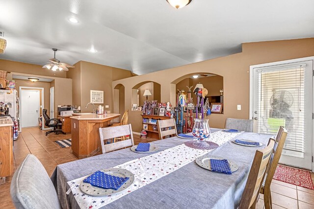 3742 Via Capitola, Madera, CA 93637 - dining area with light tile patterned flooring, arched walkways, and ceiling fan