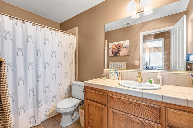 3742 Via Capitola, Madera, CA 93637 - full bathroom with vanity, tile patterned flooring, and a shower with curtain