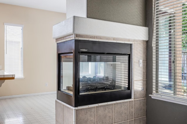 7507 N Constance Ave, Fresno, CA 93722 - detailed view of tile patterned floors and baseboards