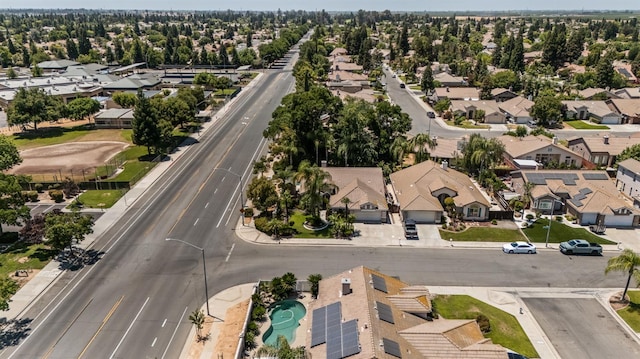 7507 N Constance Ave, Fresno, CA 93722 - aerial perspective of suburban area with a pool area