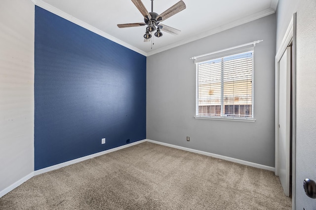 7507 N Constance Ave, Fresno, CA 93722 - carpeted empty room featuring crown molding and a ceiling fan