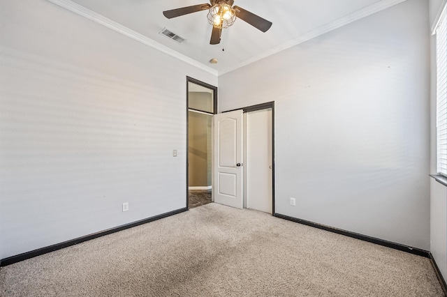 7507 N Constance Ave, Fresno, CA 93722 - unfurnished bedroom featuring ornamental molding, carpet, a closet, and ceiling fan