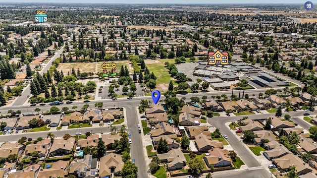 7507 N Constance Ave, Fresno, CA 93722 - aerial view of property and surrounding area featuring nearby suburban area