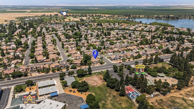 7507 N Constance Ave, Fresno, CA 93722 - aerial view of residential area featuring a large body of water