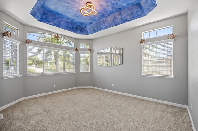 7507 N Constance Ave, Fresno, CA 93722 - unfurnished room featuring healthy amount of natural light and carpet floors