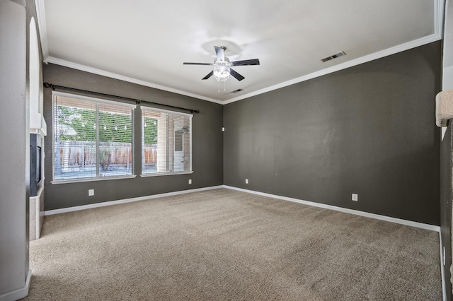 7507 N Constance Ave, Fresno, CA 93722 - carpeted spare room with ornamental molding and ceiling fan
