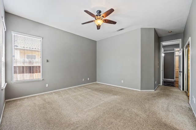 7507 N Constance Ave, Fresno, CA 93722 - carpeted empty room featuring a ceiling fan and baseboards