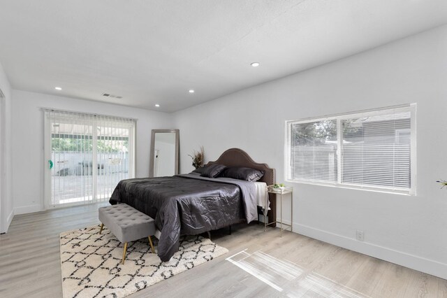 438 E Cortland Ave, Fresno, CA 93704 - bedroom with access to outside, light wood-type flooring, and recessed lighting