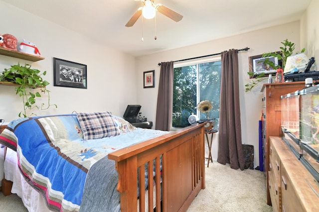 9544 N Whitehouse Dr, Fresno, CA 93720 - bedroom featuring light carpet and a ceiling fan