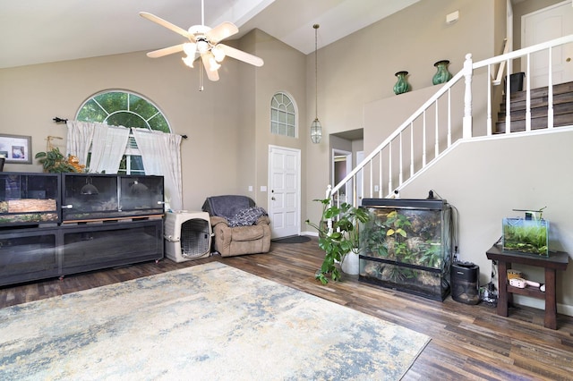 9544 N Whitehouse Dr, Fresno, CA 93720 - living area with stairway, wood finished floors, high vaulted ceiling, and a ceiling fan