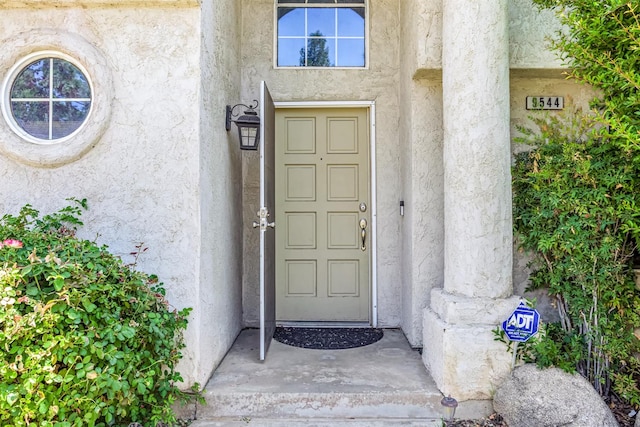 9544 N Whitehouse Dr, Fresno, CA 93720 - doorway to property featuring stucco siding