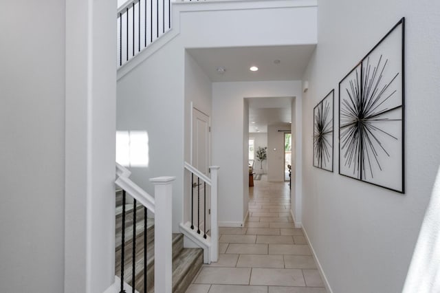 4670 Terrace Rd, Madera, CA 93636 - hall featuring light tile patterned flooring, recessed lighting, and stairway