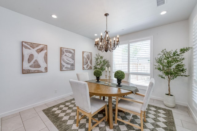 4670 Terrace Rd, Madera, CA 93636 - dining area with light tile patterned floors, a chandelier, and recessed lighting