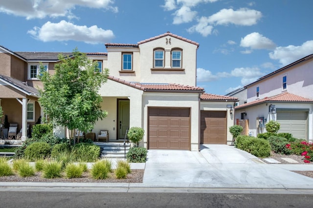 4670 Terrace Rd, Madera, CA 93636 - mediterranean / spanish home with a tile roof, concrete driveway, and stucco siding