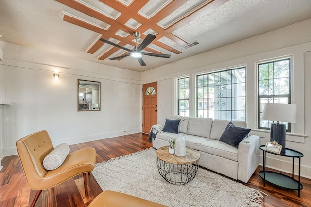 730 E Yale Ave, Fresno, CA 93704 - living area with plenty of natural light, a ceiling fan, and wood finished floors