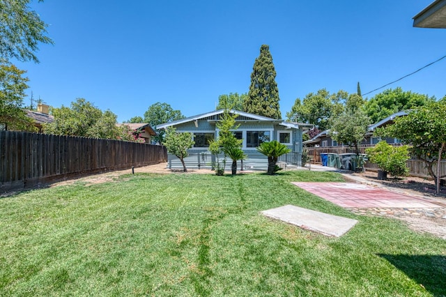 730 E Yale Ave, Fresno, CA 93704 - fenced backyard with a patio