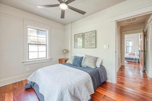 730 E Yale Ave, Fresno, CA 93704 - bedroom featuring wood finished floors and ceiling fan