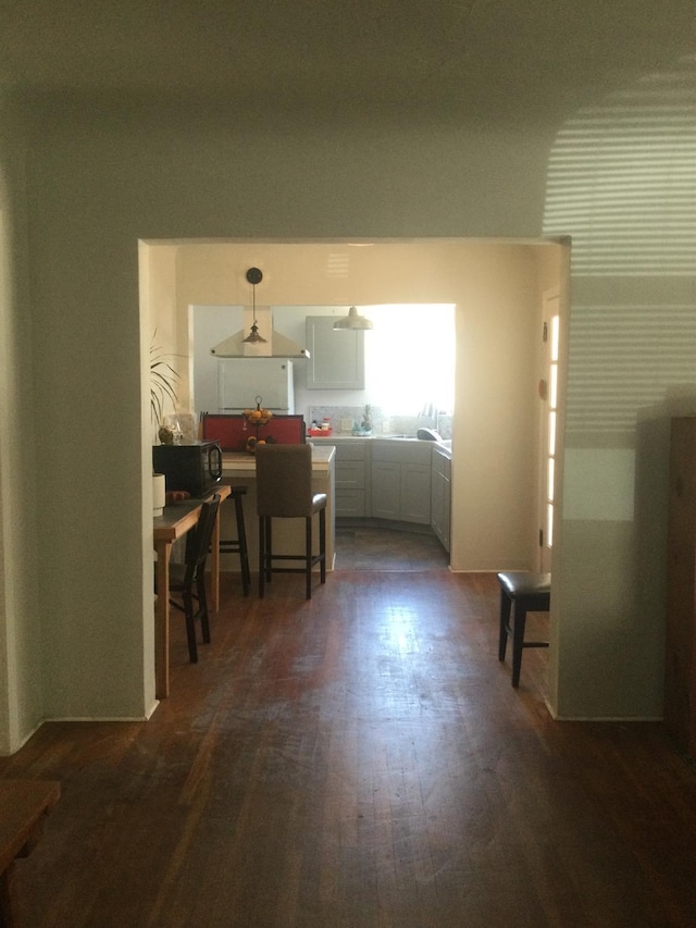 411 E Fountain Way, Fresno, CA 93704 - dining area featuring dark wood-style flooring