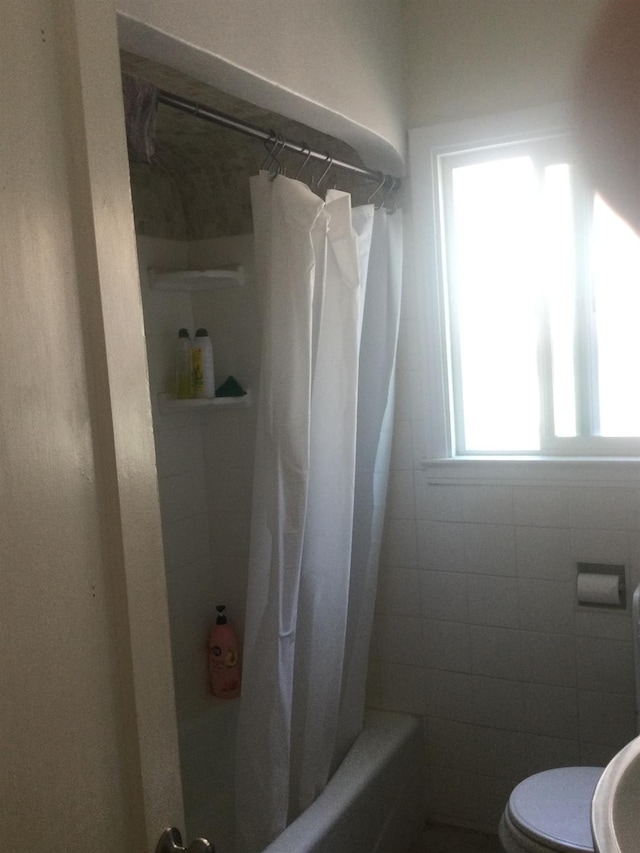 411 E Fountain Way, Fresno, CA 93704 - bathroom with shower / bath combo and toilet