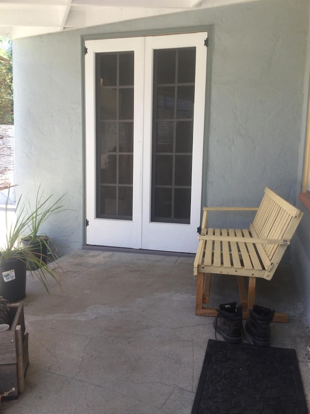 411 E Fountain Way, Fresno, CA 93704 - view of patio featuring french doors